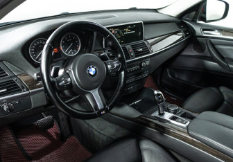 Подержанный автомобиль BMW X6 2013 года (11 фото)
