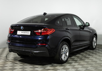 Подержанный автомобиль BMW X4 2015 года (5 фото)