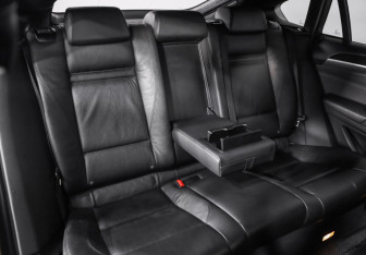 Подержанный автомобиль BMW X6 2013 года (24 фото)