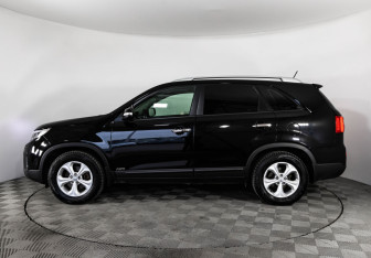 Подержанный автомобиль Kia Sorento 2014 года (8 фото)