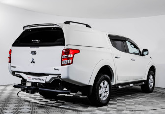 Подержанный автомобиль Mitsubishi L200 2015 года (5 фото)