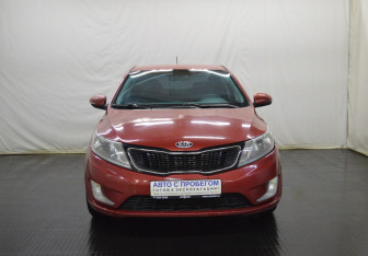 Подержанный автомобиль Kia Rio Hatchback 2013 года (2 фото)