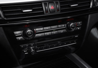 Подержанный автомобиль BMW X5 2016 года (22 фото)