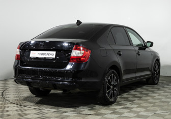 Подержанный автомобиль Skoda Rapid Liftback 2015 года (5 фото)