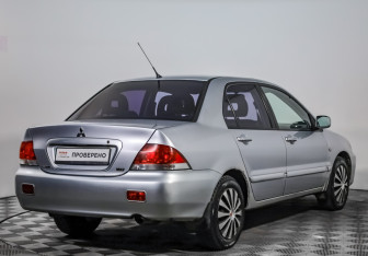 Подержанный автомобиль Mitsubishi Lancer Sedan 2006 года (5 фото)