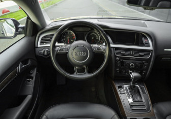 Подержанный автомобиль Audi A5 Coupe 2015 года (13 фото)