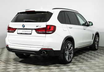 Подержанный автомобиль BMW X5 2015 года (5 фото)
