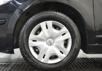 Подержанный автомобиль Nissan Tiida Sedan 2010 года (9 фото)