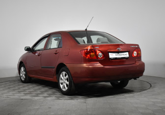 Подержанный автомобиль Toyota Corolla Sedan 2002 года (7 фото)