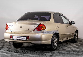 Подержанный автомобиль Kia Spectra Sedan 2006 года (5 фото)