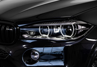Подержанный автомобиль BMW X6 2015 года (11 фото)