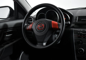 Подержанный автомобиль Mazda 3 Hatchback 2007 года (15 фото)