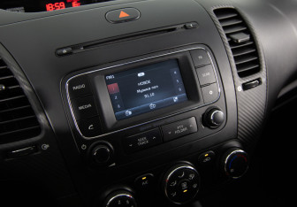 Подержанный автомобиль Kia Cerato Sedan 2013 года (16 фото)