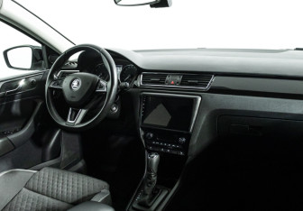 Подержанный автомобиль Skoda Rapid Liftback 2016 года (9 фото)