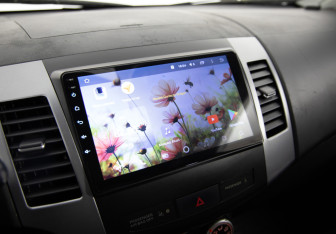 Подержанный автомобиль Mitsubishi Outlander 2008 года (16 фото)