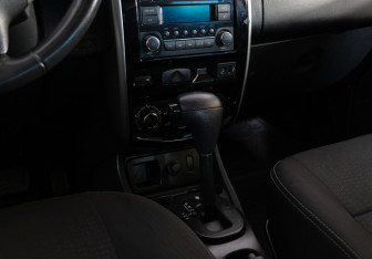 Подержанный автомобиль Nissan Terrano 2014 года (11 фото)