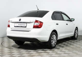 Подержанный автомобиль Skoda Rapid Liftback 2015 года (5 фото)