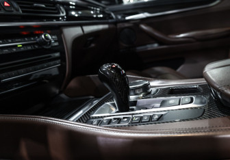 Подержанный автомобиль BMW X6 M 2015 года (28 фото)