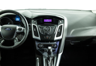 Подержанный автомобиль Ford Focus Wagon 2014 года (14 фото)