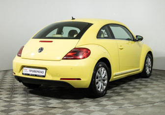 Подержанный автомобиль Volkswagen Beetle Hatchback 2014 года (5 фото)