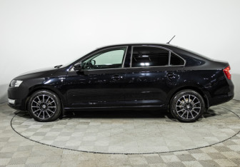 Подержанный автомобиль Skoda Rapid Liftback 2015 года (8 фото)
