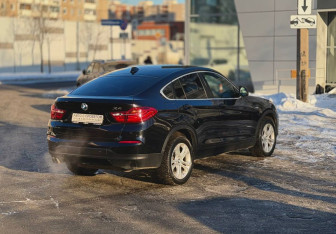 Подержанный автомобиль BMW X4 2015 года (4 фото)