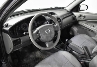 Подержанный автомобиль Nissan Almera Classic 2011 года (9 фото)