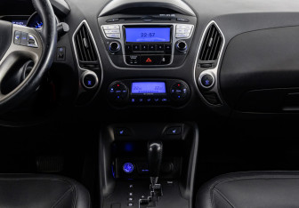 Подержанный автомобиль Hyundai ix35 2012 года (11 фото)