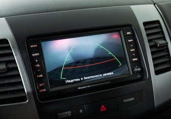 Подержанный автомобиль Mitsubishi Outlander 2012 года (15 фото)