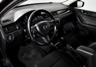 Подержанный автомобиль Skoda Rapid Liftback 2015 года (9 фото)