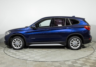 Подержанный автомобиль BMW X1 2015 года (8 фото)