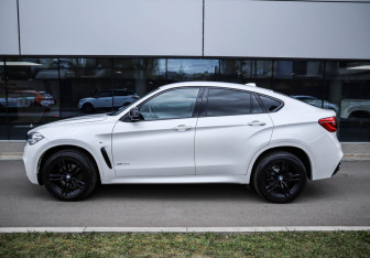 Подержанный автомобиль BMW X6 2018 года (7 фото)