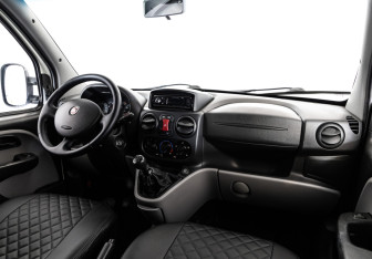 Подержанный автомобиль Fiat Doblo 2012 года (9 фото)