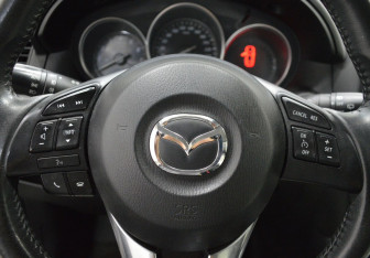 Подержанный автомобиль Mazda CX-5 2014 года (14 фото)