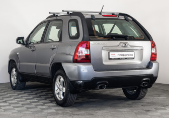 Подержанный автомобиль Kia Sportage 2009 года (7 фото)