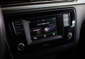 Подержанный автомобиль Skoda Rapid Liftback 2016 года (13 фото)