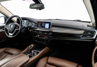 Подержанный автомобиль BMW X6 2017 года (10 фото)