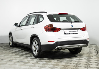 Подержанный автомобиль BMW X1 2014 года (7 фото)