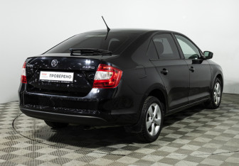 Подержанный автомобиль Skoda Rapid Liftback 2014 года (5 фото)