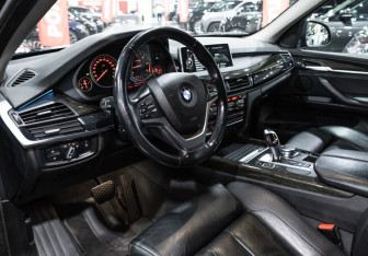 Подержанный автомобиль BMW X5 2015 года (16 фото)
