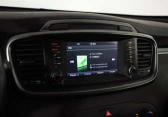Подержанный автомобиль Kia Sorento 2016 года (11 фото)