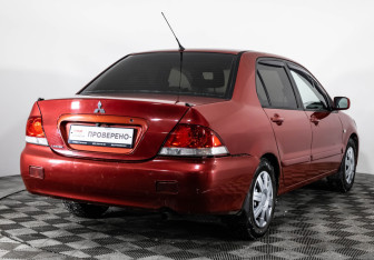 Подержанный автомобиль Mitsubishi Lancer Sedan 2005 года (5 фото)