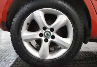 Подержанный автомобиль Skoda Fabia Hatchback 2013 года (9 фото)