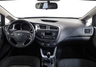 Подержанный автомобиль Kia Ceed Hatchback 2014 года (9 фото)