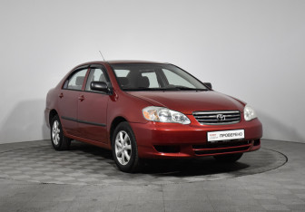 Подержанный автомобиль Toyota Corolla Sedan 2002 года (3 фото)