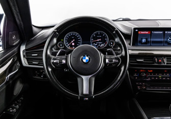 Подержанный автомобиль BMW X6 2015 года (16 фото)