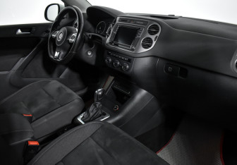 Подержанный автомобиль Volkswagen Tiguan 2016 года (13 фото)
