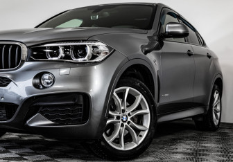 Подержанный автомобиль BMW X6 2018 года (2 фото)
