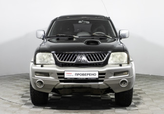 Подержанный автомобиль Mitsubishi L200 2005 года (2 фото)