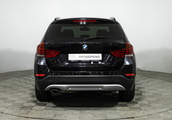 Подержанный автомобиль BMW X1 2014 года (6 фото)